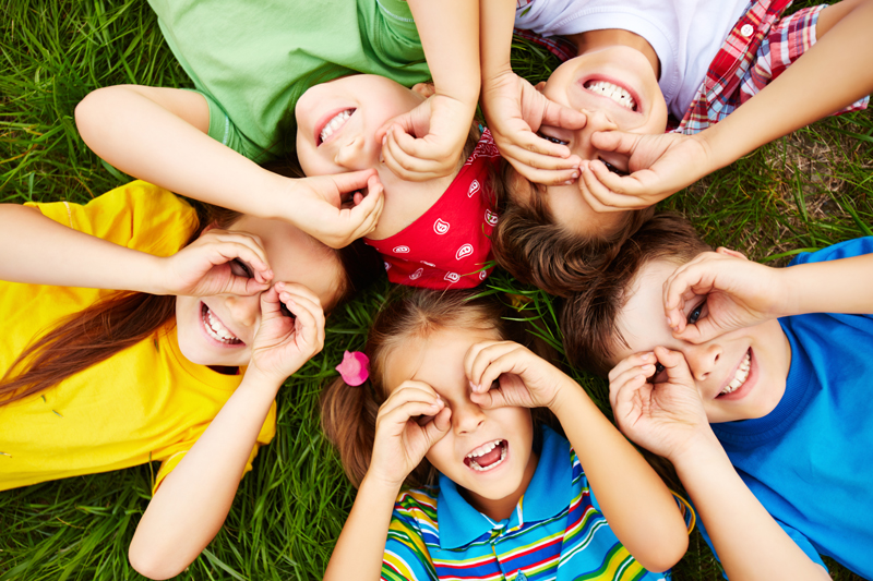 Kids playing on grass